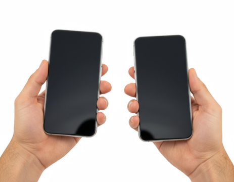 Hands holding two identical smartphones with blank screens, presented side-by-side for comparison or mockup display