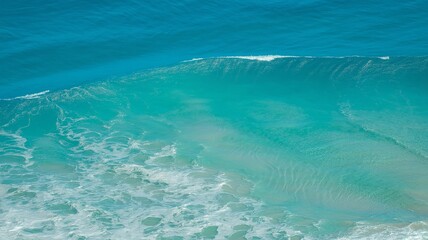 Cascading Waterfall Flowing Down Rocky Terrain Surrounded by Lush Greenery Creates Beautiful Scene