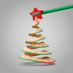 A christmas tree made of pencil shavings with a green pencil and star shaped sharpener above it. Christmas creative post add