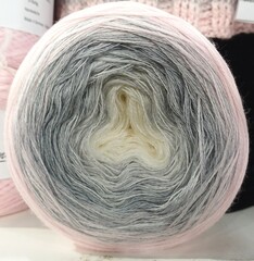 Gradient yarn cake with pink and grey colors