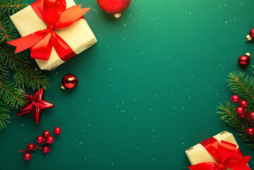 Christmas background with xmas tree, red decorations, gifts, presents on green background. Merry...