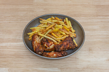 fried chicken with crispy korokke potatoes, served on a bamboo tray with lemon and Japanese mayonnaise