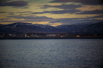 Coastal Town at Sunset with Snowy Mountains, Iceland