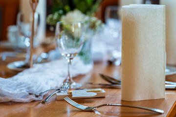 The wedding table in close up view with bokeh background