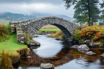 Obraz premium Pont-ar-Eden historic stone bridge spanning river Eden, Wales