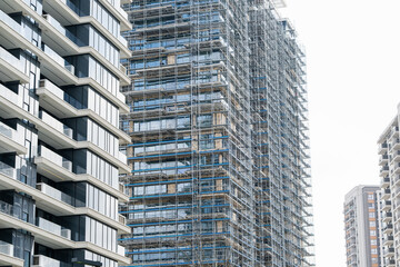Construction of a building using scaffolding