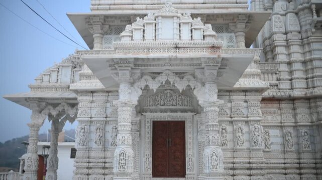 Aerial and ground shots of Lacchuar Jain Temple in Jamui, Bihar showcasing its ancient Jain architecture, serene hilltop setting and peaceful natural surroundings. Clear details, clean lines and herit