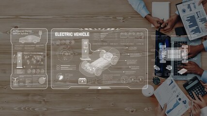 This image showcases a detailed infographic on electric vehicle technology, highlighting charging processes and innovative design in a collaborative workspace setting. Raster - Powered by Adobe