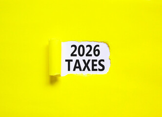 2026 taxes new year symbol. Concept words 2026 taxes on beautiful white paper. Beautiful yellow paper background. Business and 2026 taxes new year concept. Copy space.