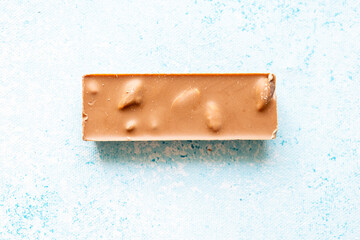  Close-Up of Pistachio Chocolate on Blue Background
