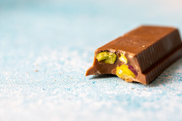  Close-Up of Pistachio Chocolate on Blue Background
