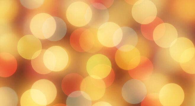 Blurred christmas lights background with gold tones creating warm and festive mood for holiday season and celebrations in abstract and soft bokeh style