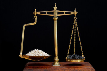 Balancing different legumes on old fashioned grocer's scales