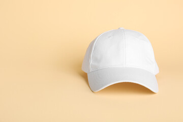 Blank white cap on yellow background