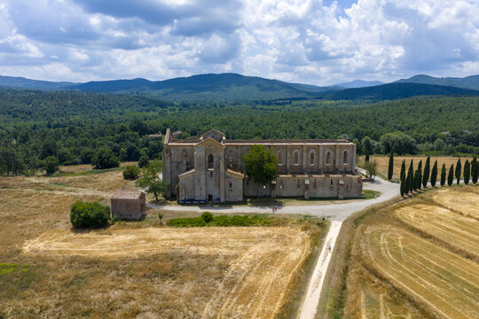 Abbazia di San Galgano ruins in fields - Chiusdino, Italy
