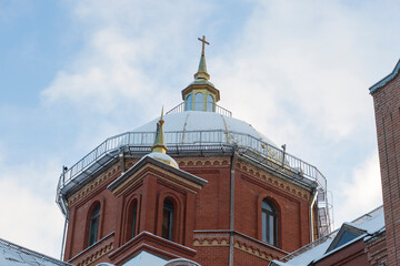 Obraz premium Catholic Church. The cross on the dome of a Catholic church.