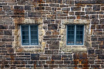 Stone windows on Halifax Citadel showcase historic architectural design in Nova Scotia, Canada.