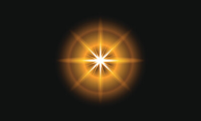 Bright golden starburst light effect on dark background
