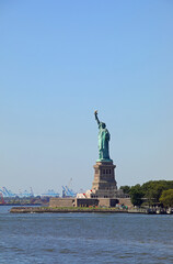Fototapeta premium statue of liberty symbol of american freedom and democracy in new york seen from a ship