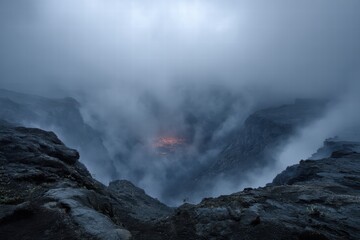 Fog envelops a volcanic crater revealing glowing lava beneath the mist in a surreal landscape filled with unusual weather phenomena