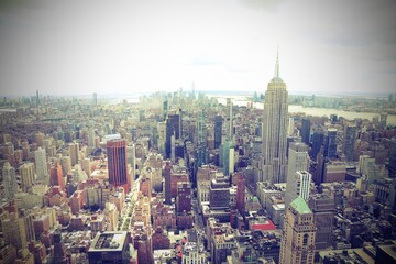 Naklejka premium view of new york city to the south and the iconic empire state building with old toned effect