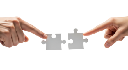 Hands connecting jigsaw puzzle pieces on white background