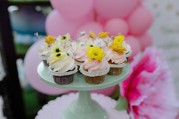 colorful cupcakes on a cake stand