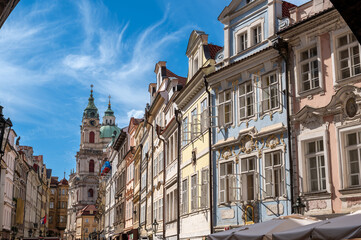 Fototapeta premium Prague, Czech Republic, August 9, 2023. Shot on a beautiful summer day, from Charles Bridge towards the old Town district. The colorful facades stand out. Crowded with people. Travel destinations.