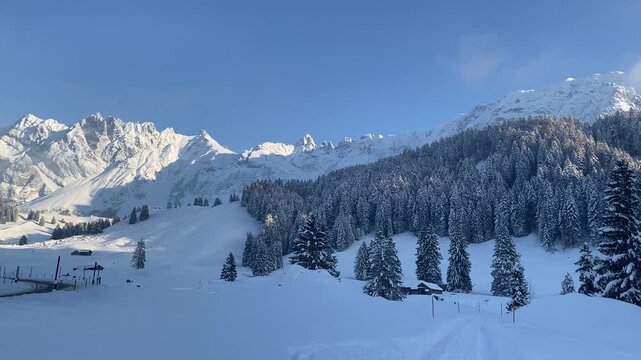 snow covered mountains (santis)