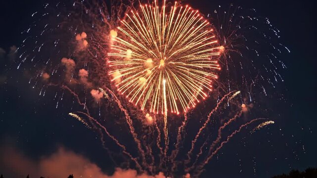 A Vibrant Fireworks Display Illuminates the Night Sky with Explosive Colors and Festive Light