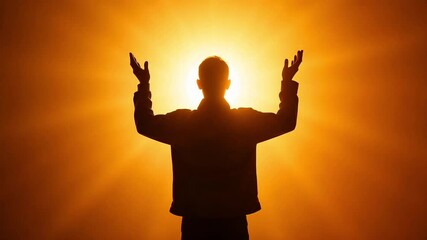 Man raising arms in silhouette against bright golden light, spiritual awakening moment, feeling the energy, religious devotion, worship and prayer, hope concept