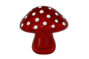 Red glass mushroom figurine with white polka dots, a whimsical decorative object on a transparent background