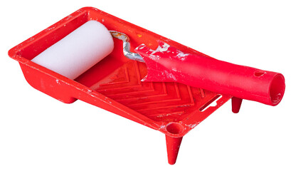 Paint tray with paint roller on an isolated background.