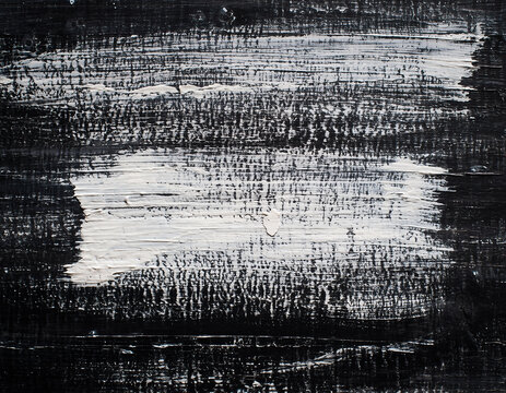 Abstract black and white painting with rough brush strokes creating a textured background
