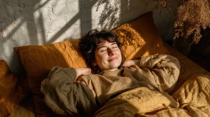 Obraz premium Young adult wakes up feeling refreshed and content in sunlight streaming into the bedroom