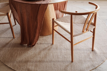 Elegant dining set with natural materials in a modern interior decor setting