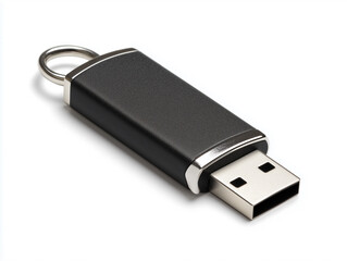 Black USB flash drive placed on a light surface with a focus on detail and design