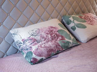 The bedroom in the apartment is in colorful bright red tones.