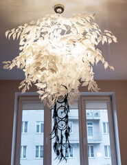 The bedroom in the apartment is in colorful bright red tones.