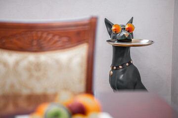 Interior photo of Living room with furniture, table and decorative elements.