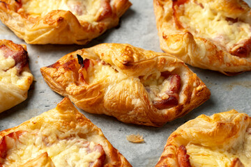 Cheese Bacon Turnovers pastry on baking paper