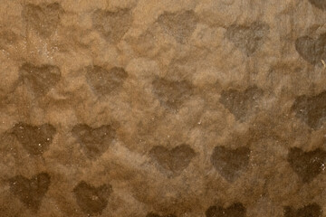 Heart shapes on oily baking paper
