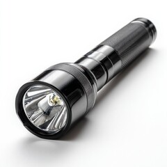 Close-up of a black metal flashlight on a white surface.