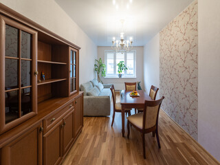 Interior photo of Living room with furniture, table and decorative elements.