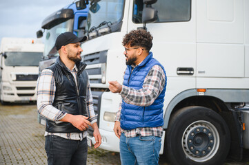 Truck drivers discussing logistics and transportation industry