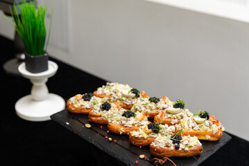 Gourmet appetizers on slate platter