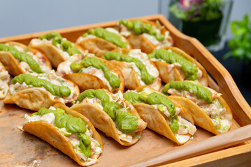 Delicious chicken tacos with guacamole