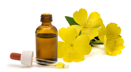 Common evening primrose  flowers  with  essence bottle