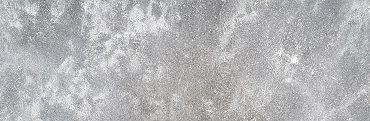 Rough gray concrete texture with distressed grunge details, weathered cement surface for industrial backgrounds, urban backdrops, minimalist designs, abstract graphic projects. Grainy, modern.