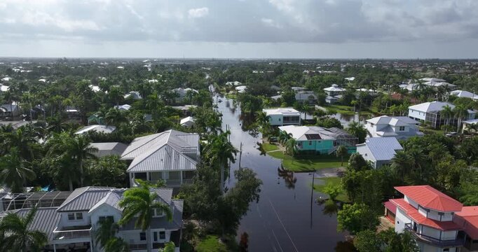 Tropical rainstorm flooded residential homes in suburban community in Punta Gorda, Florida. Hurricane Milton aftermath.